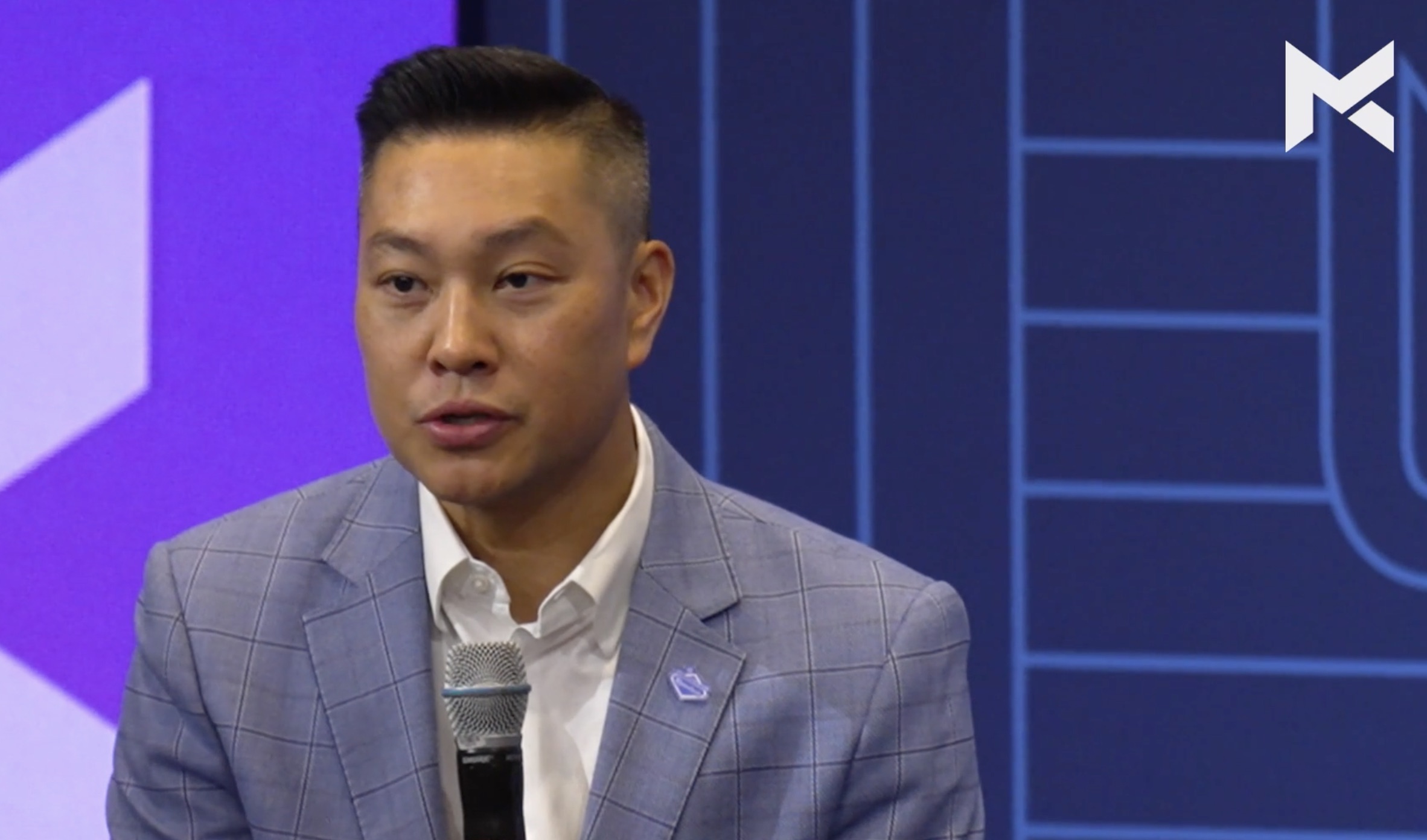 James Wong speaking at event