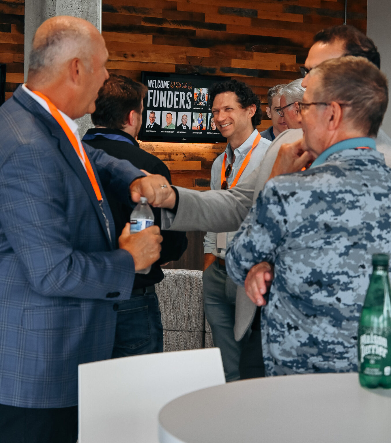 Group of men networking in an event space