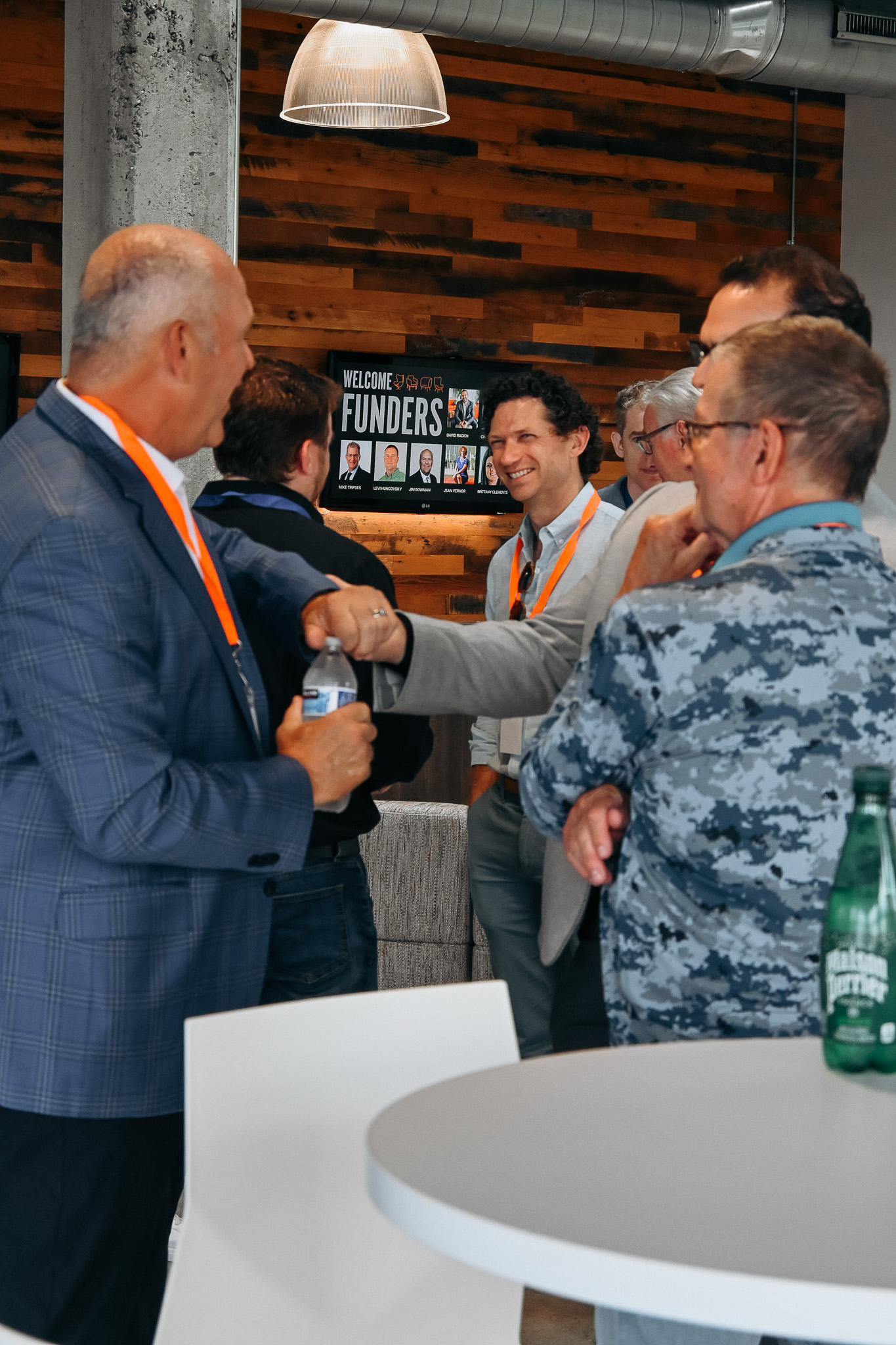 Group of men networking in an event space