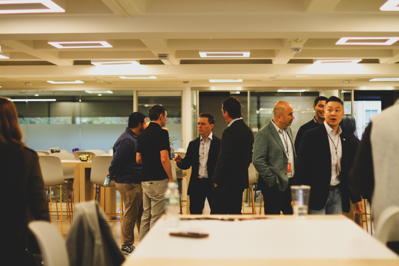 Insurance and WealthTech professionals talking in a room